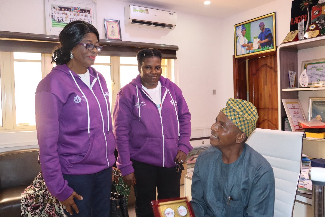 Oluwadamilola Ojo and Dr Adenekan with Honourable Commissioner of Education